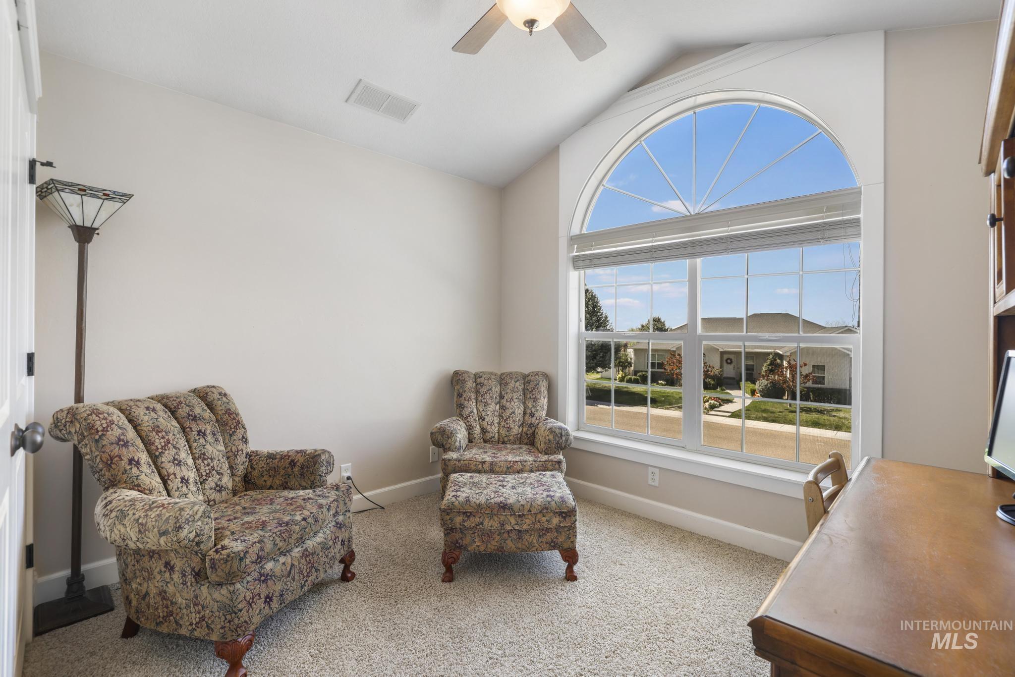 1111 Cole Street Kimberly, ID 83341 - Photo 26 of 46 Living area featuring light colored carpet and ceiling fan