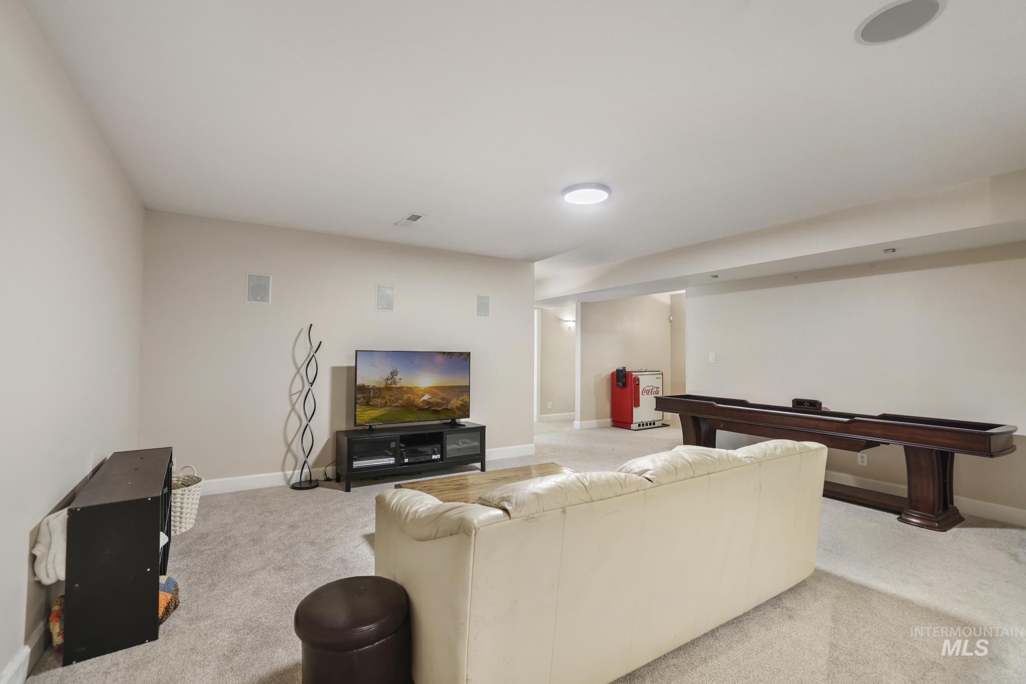 1111 Cole Street Kimberly, ID 83341 - Photo 34 of 46 Living room with light colored carpet and baseboards