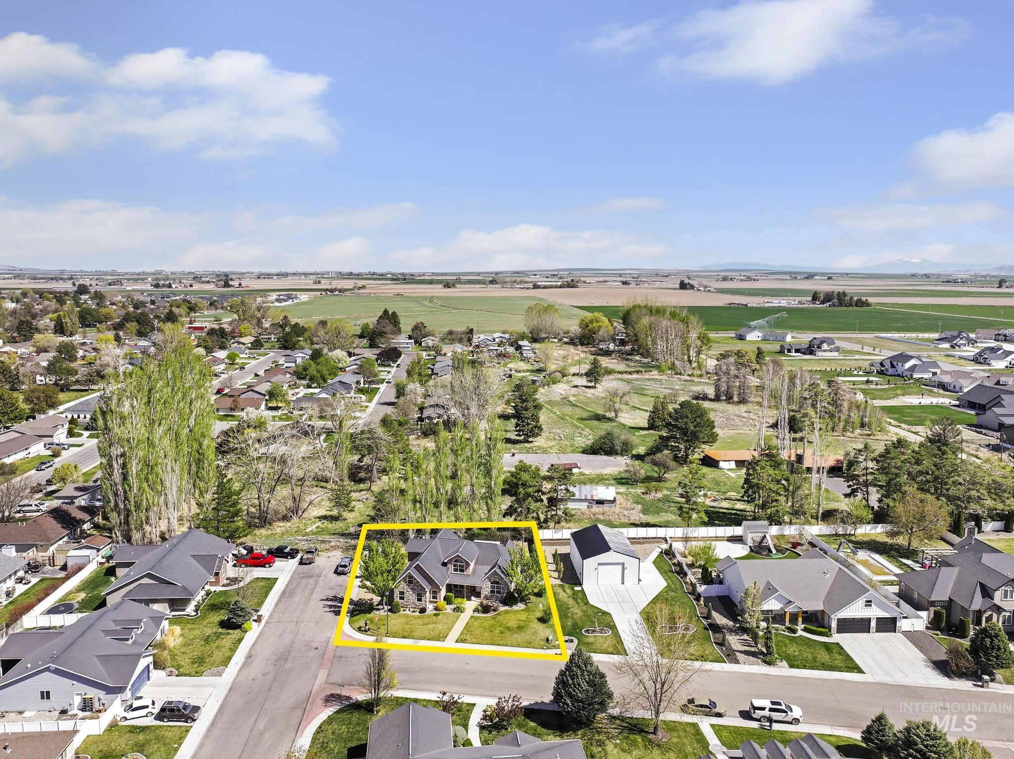 1111 Cole Street Kimberly, ID 83341 - Photo 46 of 46 Aerial perspective of suburban area featuring property parcel outlined