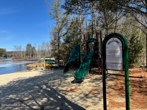 a view of swimming pool from a lounge chair