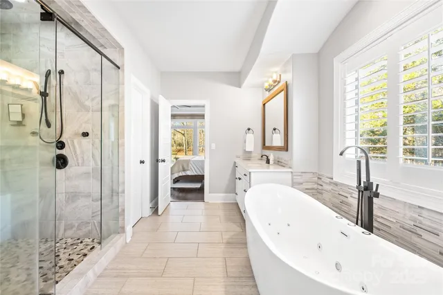a view of a dining room with furniture wooden floor and chandelier