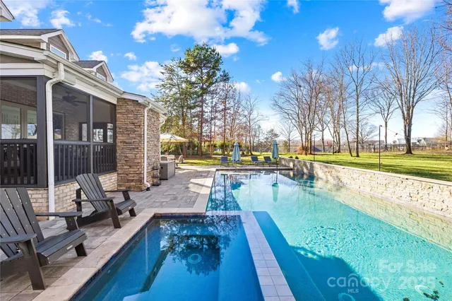 a bedroom with furniture and window