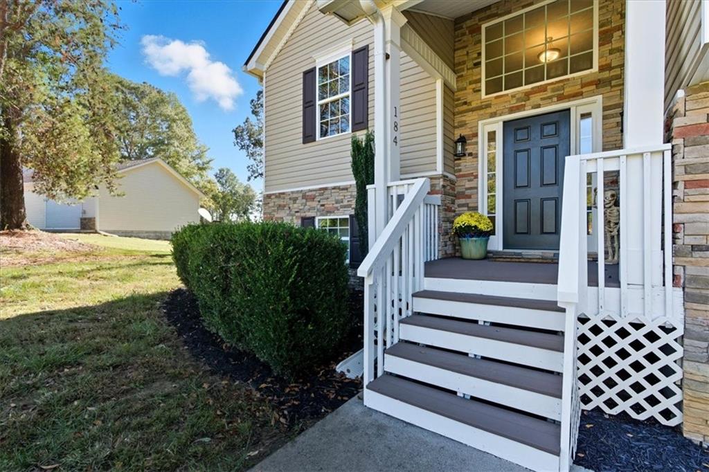 184 Morgan Lane Rockmart, GA 30153 - Photo 1 of 1 a view of a house with backyard and deck