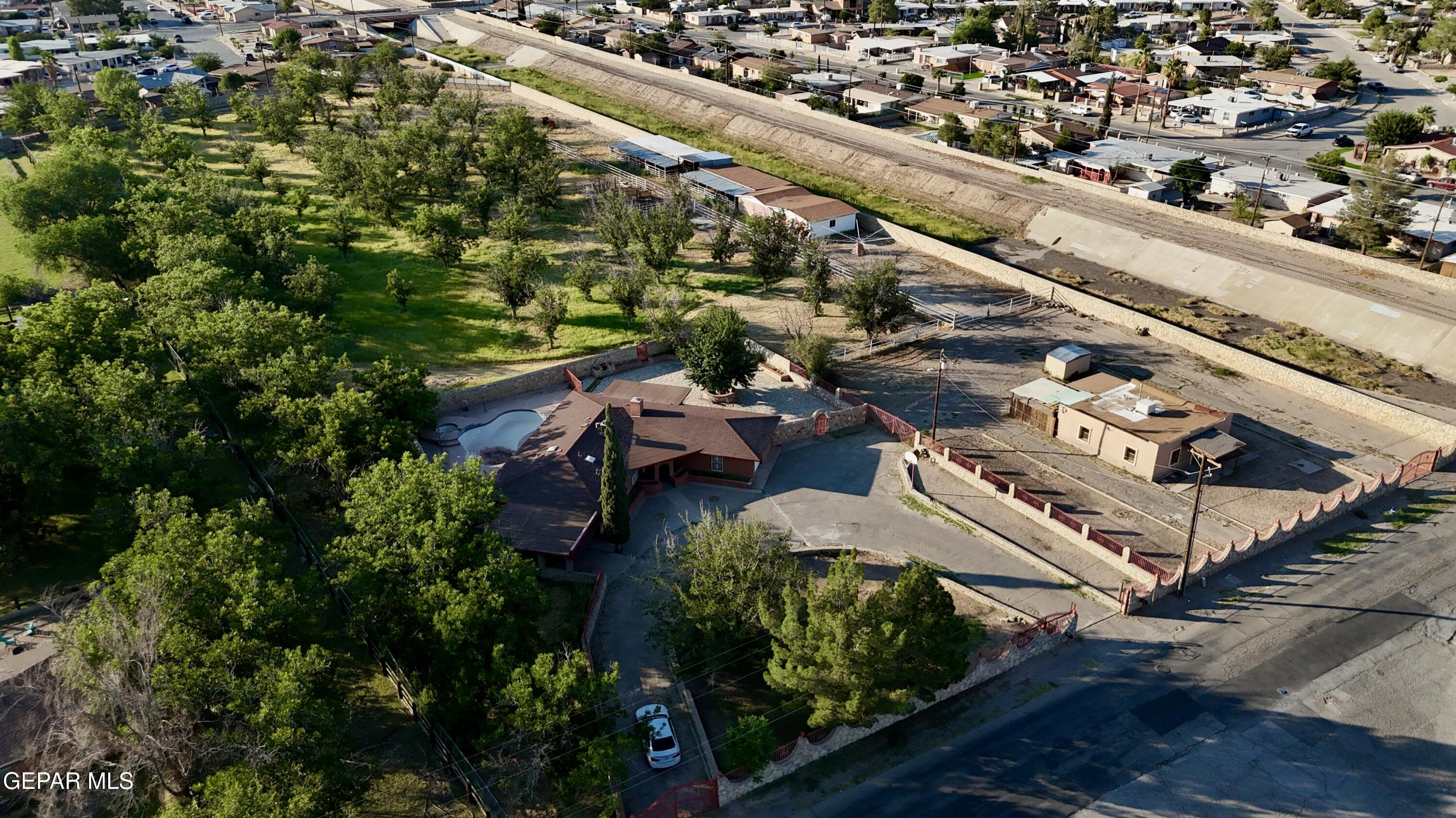 875 Le Barron Road El Paso, TX 79907 - Photo 3 of 14 an aerial view of a residential houses with outdoor space and street view