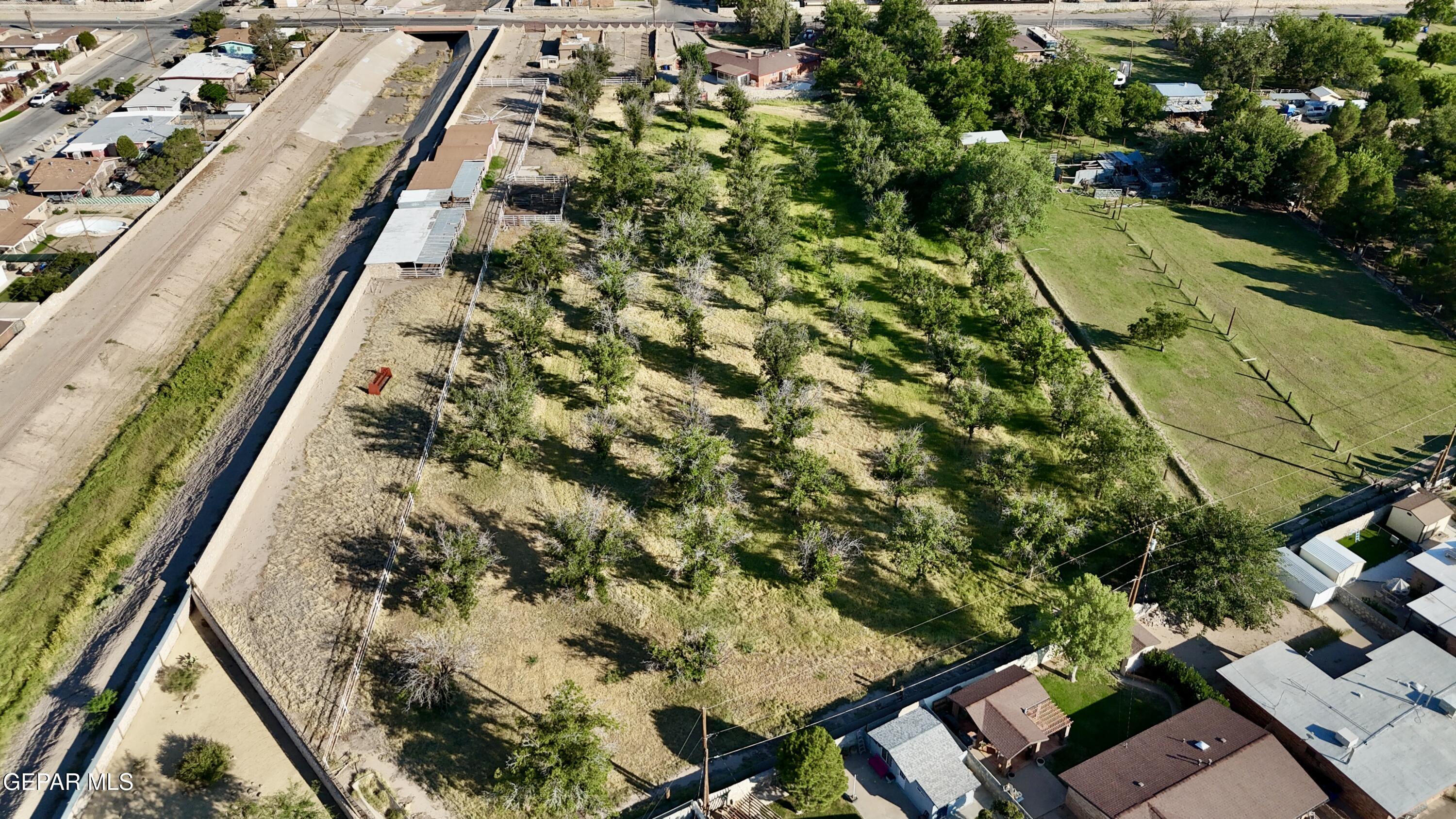 875 Le Barron Road El Paso, TX 79907 - Photo 5 of 14 an aerial view of a residential houses with yard
