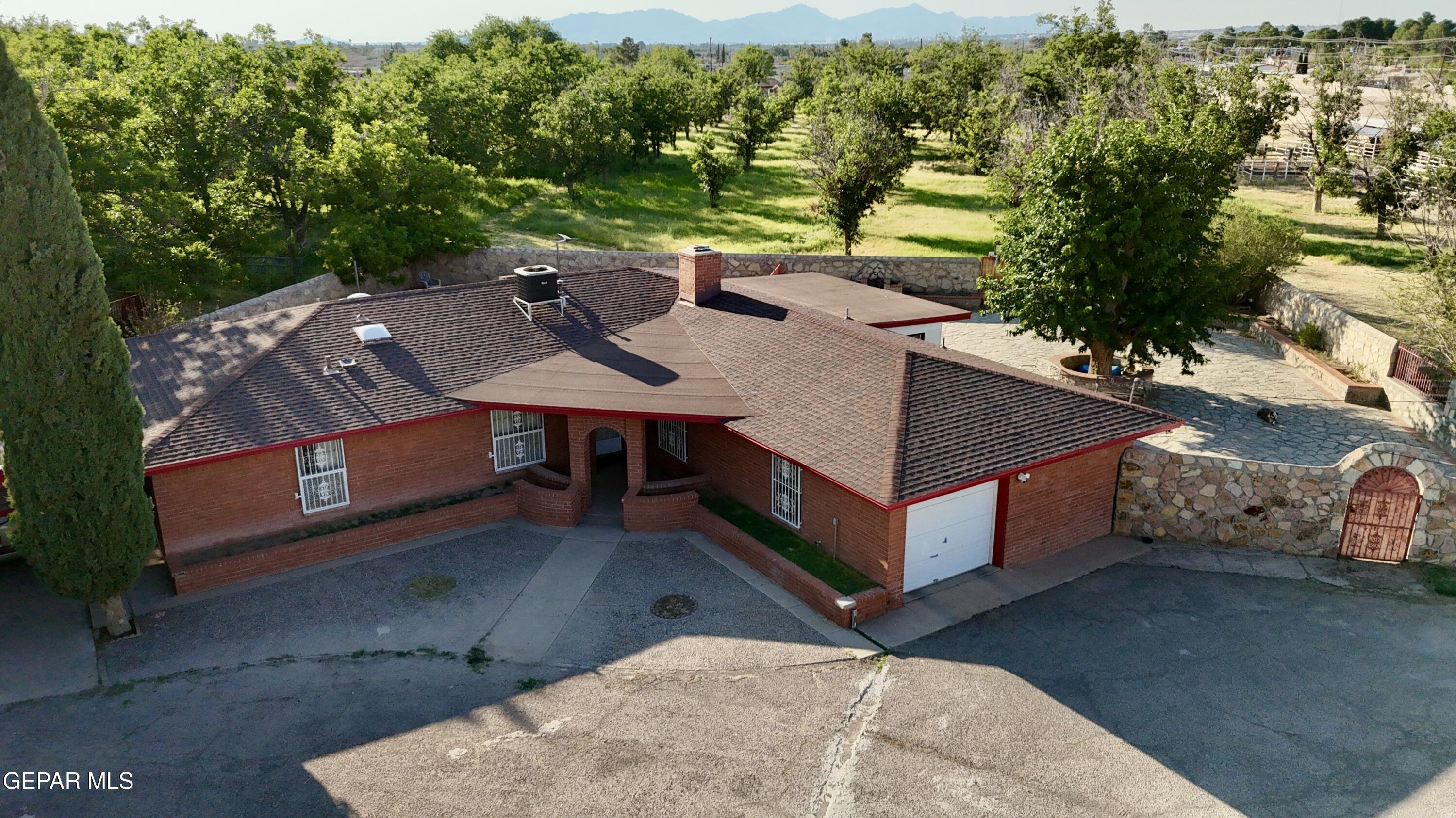 875 Le Barron Road El Paso, TX 79907 - Photo 9 of 14 a view of a backyard with sitting area