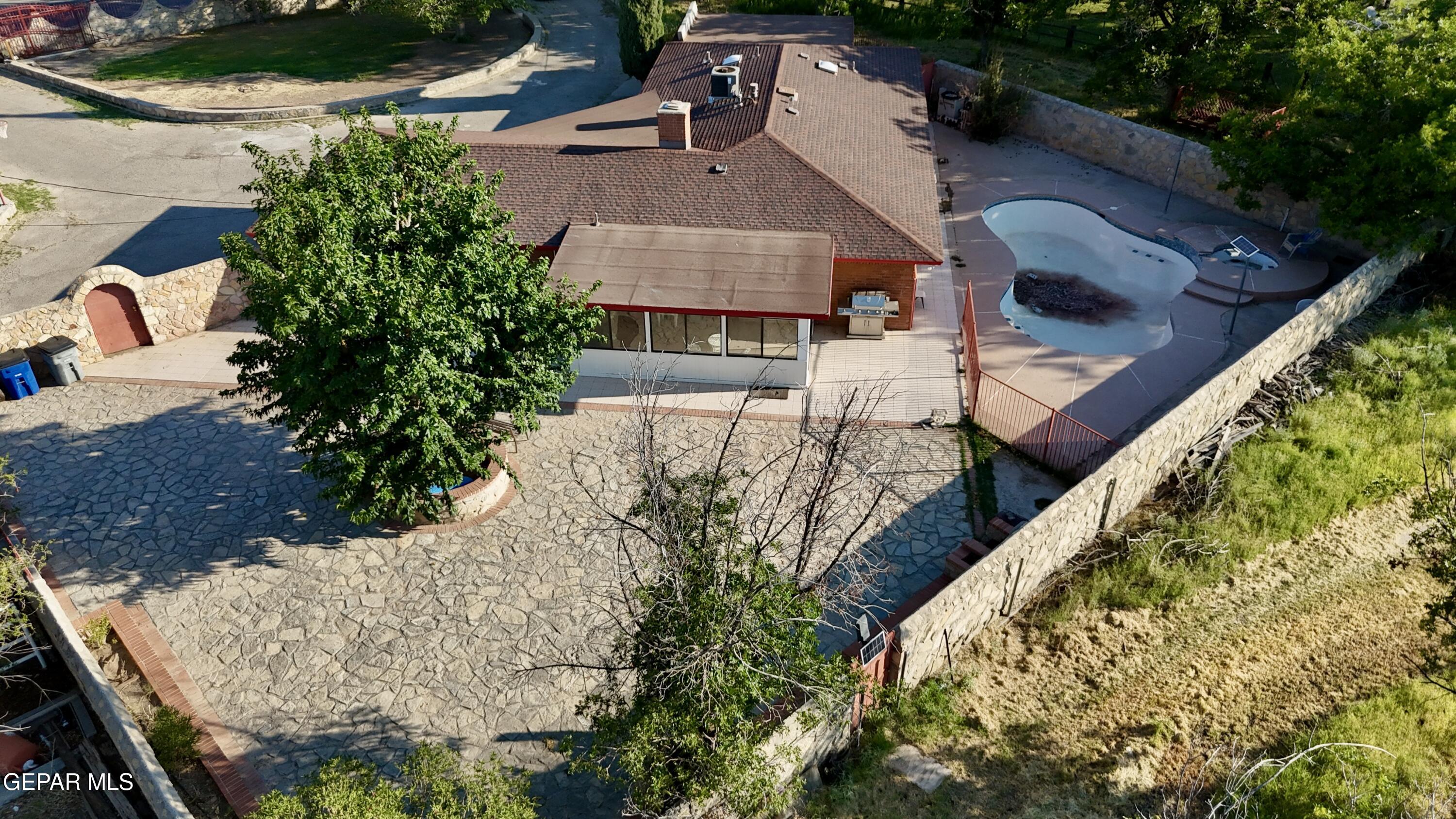 875 Le Barron Road El Paso, TX 79907 - Photo 10 of 14 an aerial view of a house with a yard