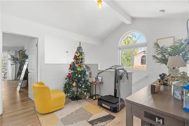 a living room with couch and a window