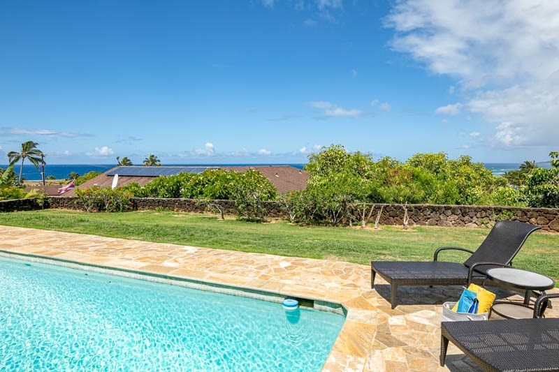 2301 Ho'ohu Road Koloa, HI 96756 - Photo 26 of 28 a view of a yard with an outdoor space and seating
