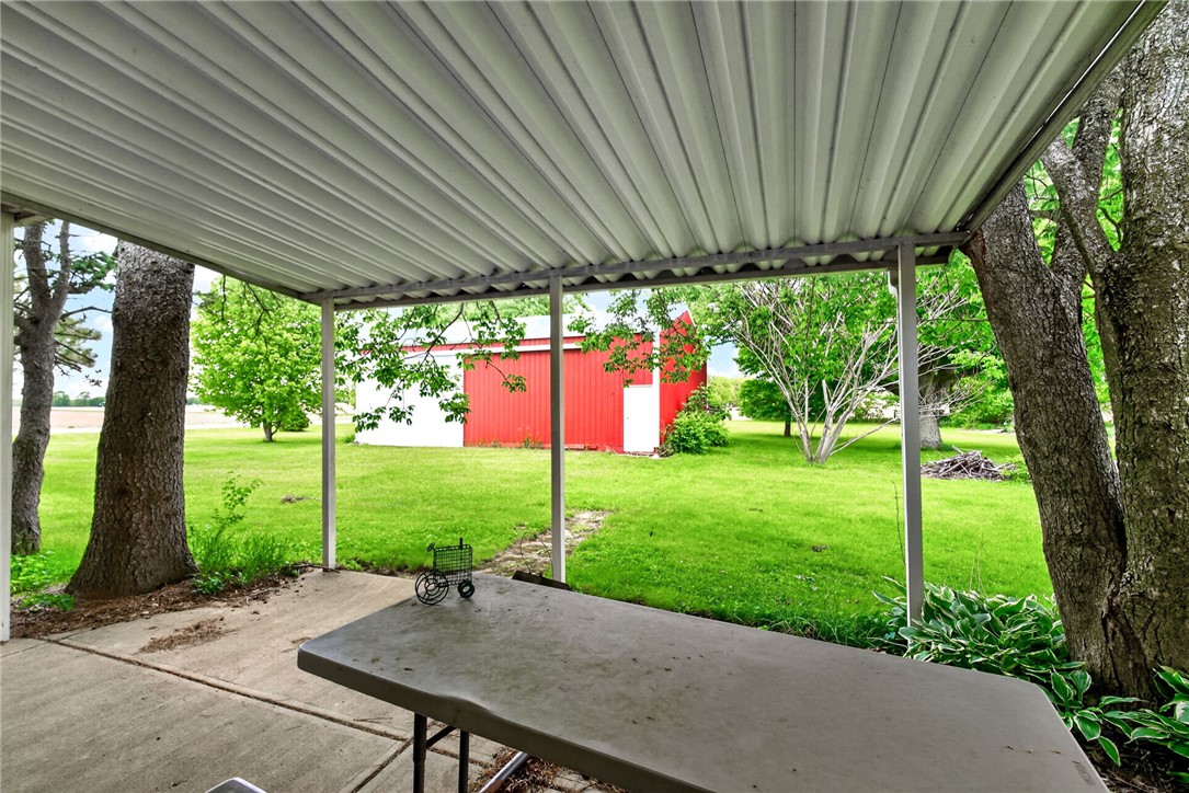 2470 Clark Run Road Xenia, OH 45385 - Photo 39 of 57 This tranquil outdoor space offers a peaceful retreat with verdant surroundings and a view of a charming barn.