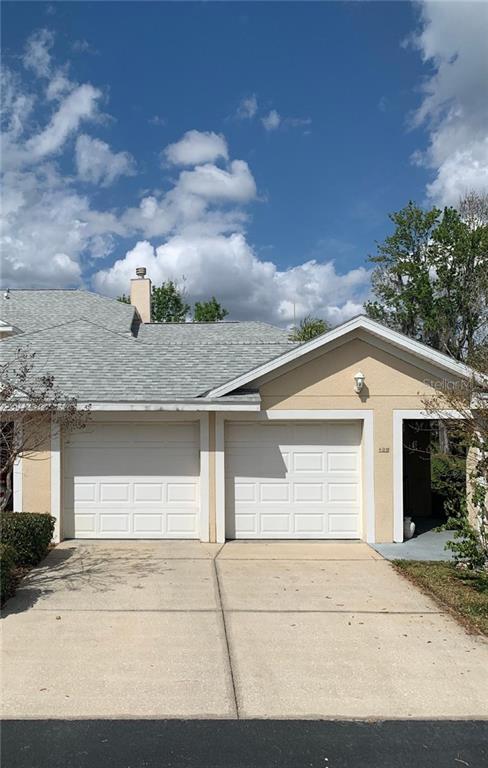 400 Silver Sea Road Winter Springs, FL 32708 - Photo 1 of 11 a front view of a house with a yard and garage