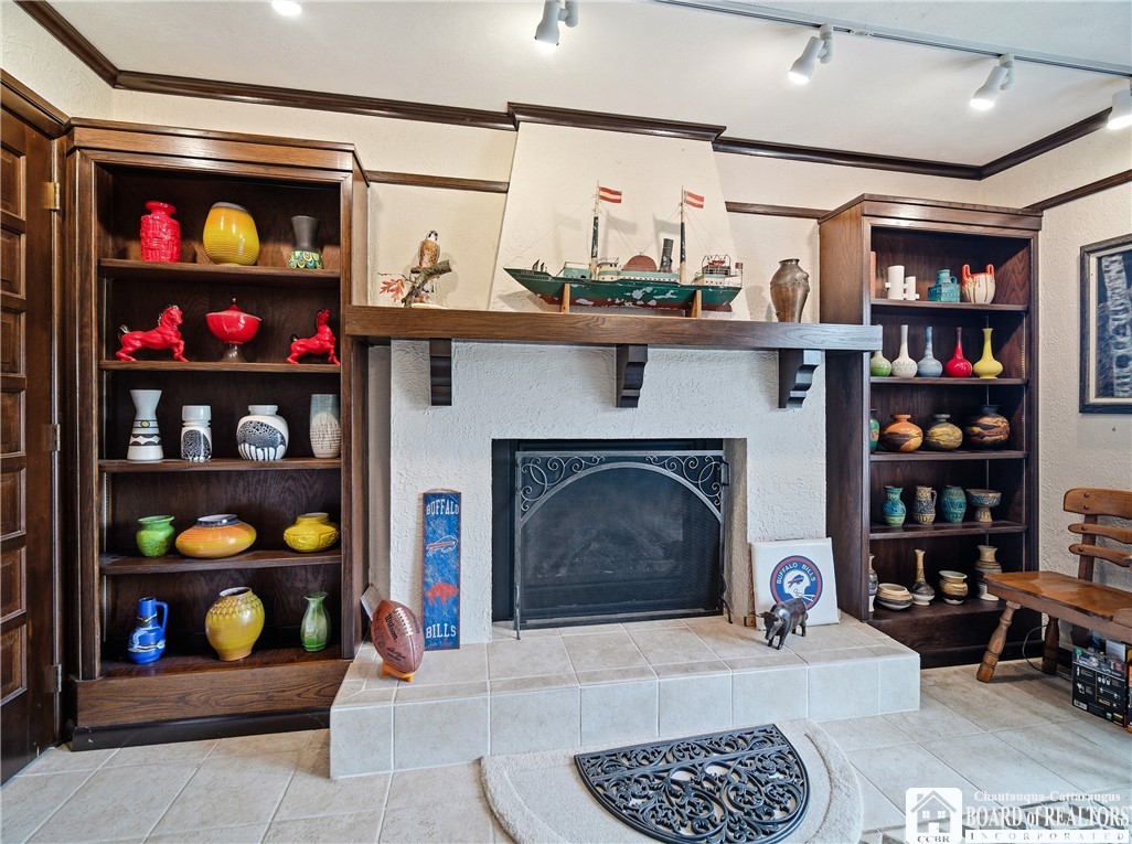 4671 Pickard Road Dewittville, NY 14728 - Photo 13 of 41 Gas fireplace and builtins.