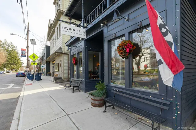 a view of path along with retail shop and building