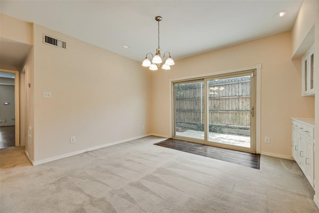 4988 Thunder Road Dallas, TX 75244 - Photo 12 of 32 Oversized dining room with built-in cabinetry