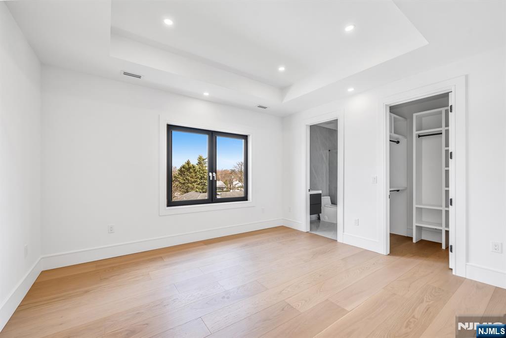 356 Bullard Avenue Paramus, NJ 07652 - Photo 38 of 50 a view of an empty room with a painting
