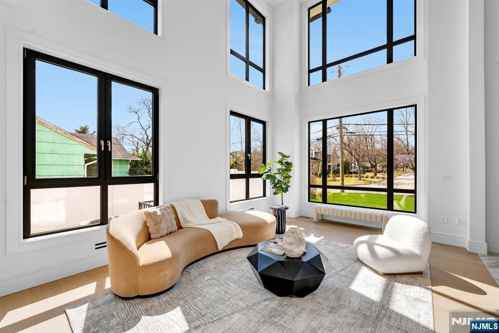 356 Bullard Avenue Paramus, NJ 07652 - Photo 10 of 50 a living room with furniture and a large window