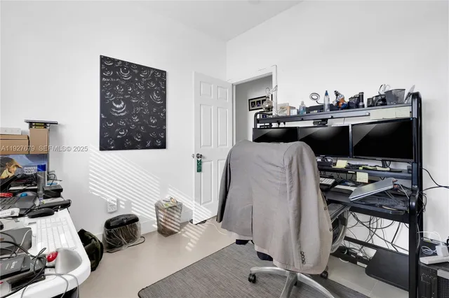 a swimming pool with outdoor seating and yard