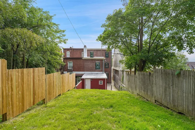 a view of a backyard with a garden