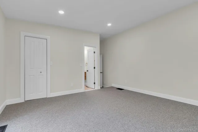 an empty room with an entryway