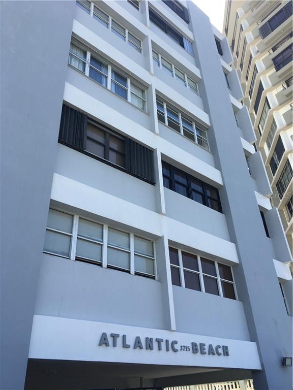 37 Isla Verde, Unit 3715 Carolina, PR 00979 - Photo 1 of 1 a view of a building