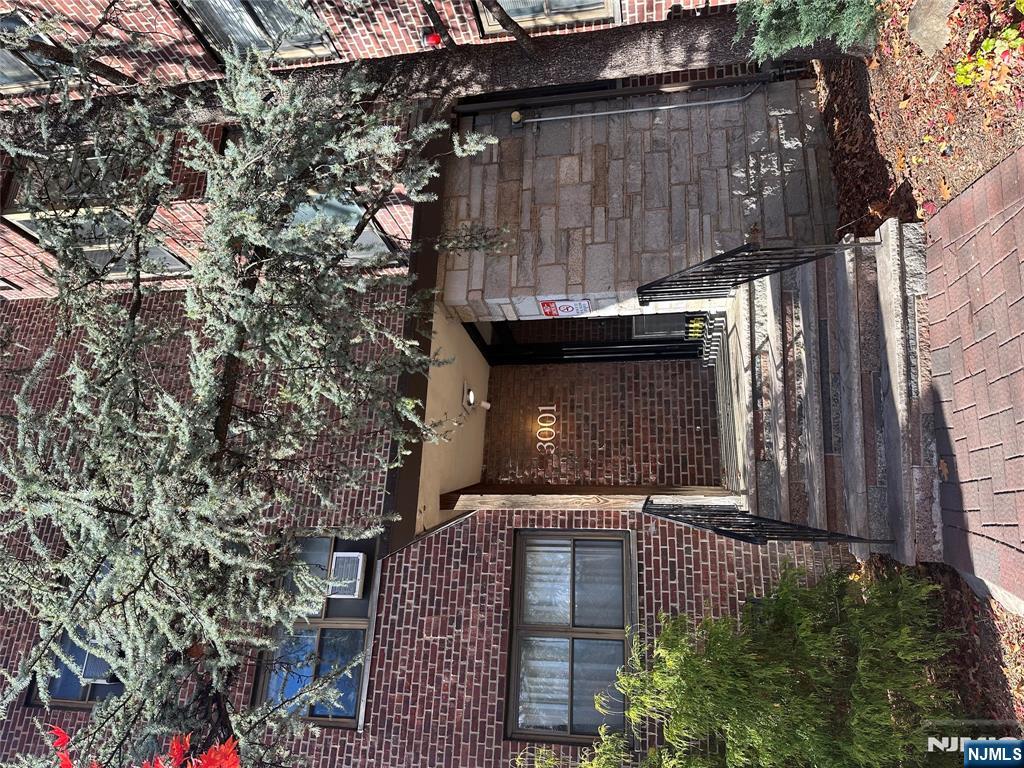 3001 Edwin Avenue, Unit 2E Fort Lee, NJ 07024 - Photo 1 of 7 a front view of a house