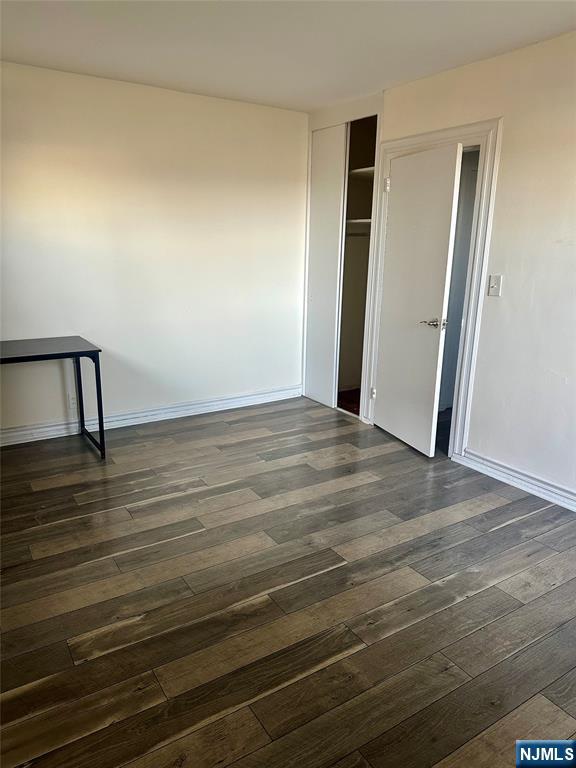 3001 Edwin Avenue, Unit 2E Fort Lee, NJ 07024 - Photo 6 of 7 a view of empty room with wooden floor