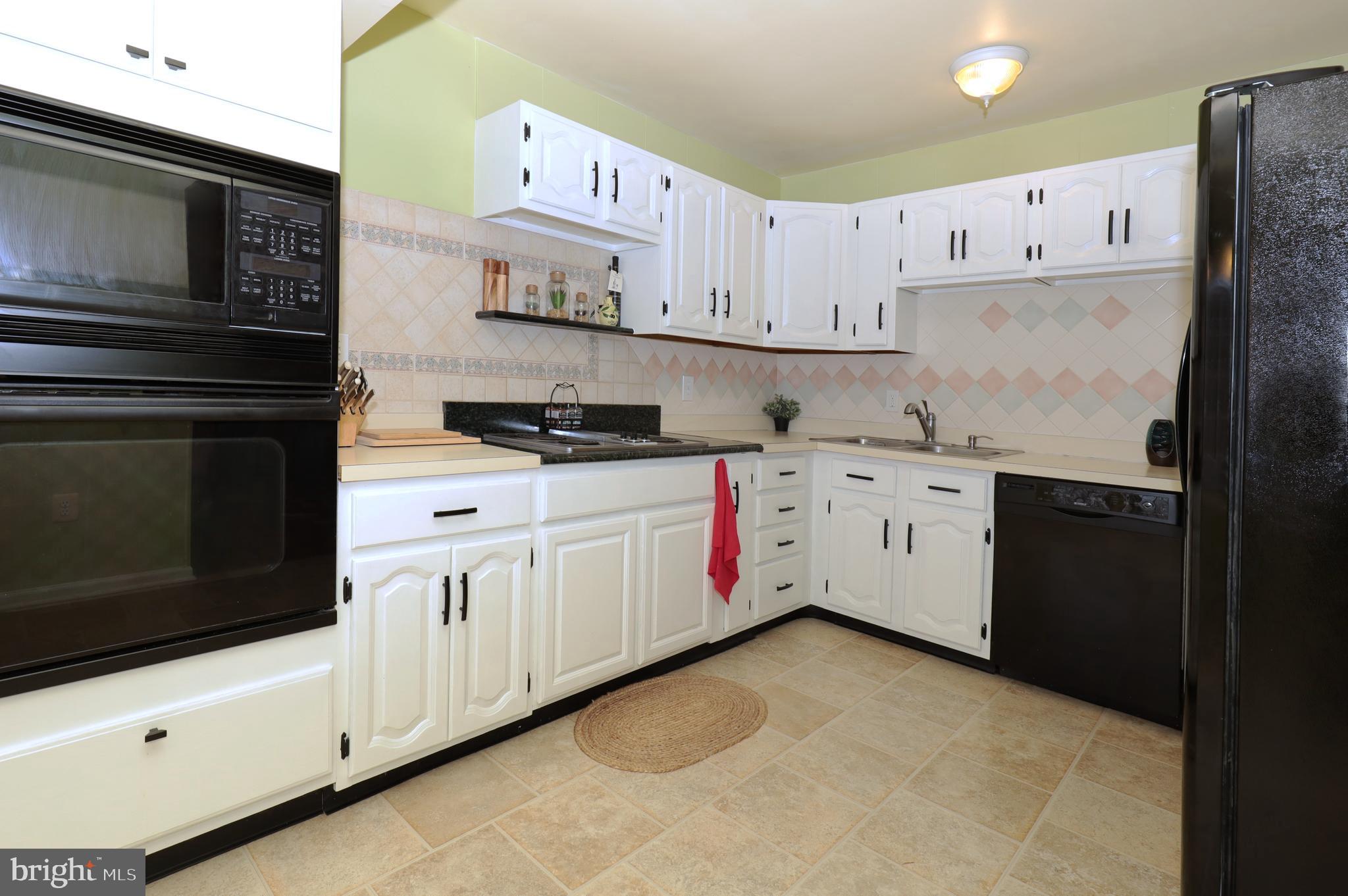 1903 Ridge Road Haymarket, VA 20169 - Photo 8 of 51 Kitchen with Painted Cabinets