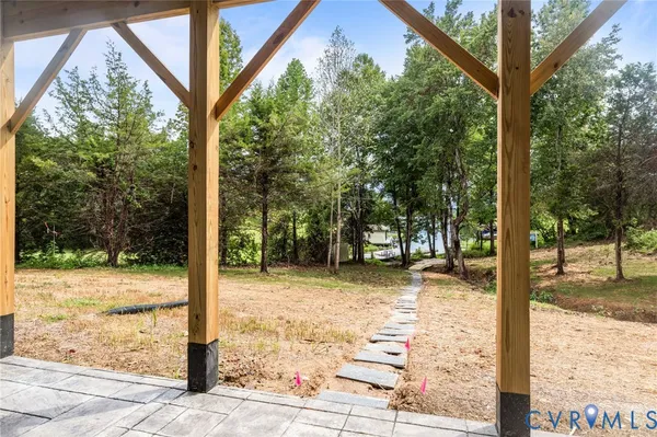 a view of outdoor space with deck and wooden floor