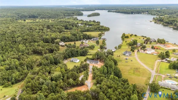 a view of a lake with a yard