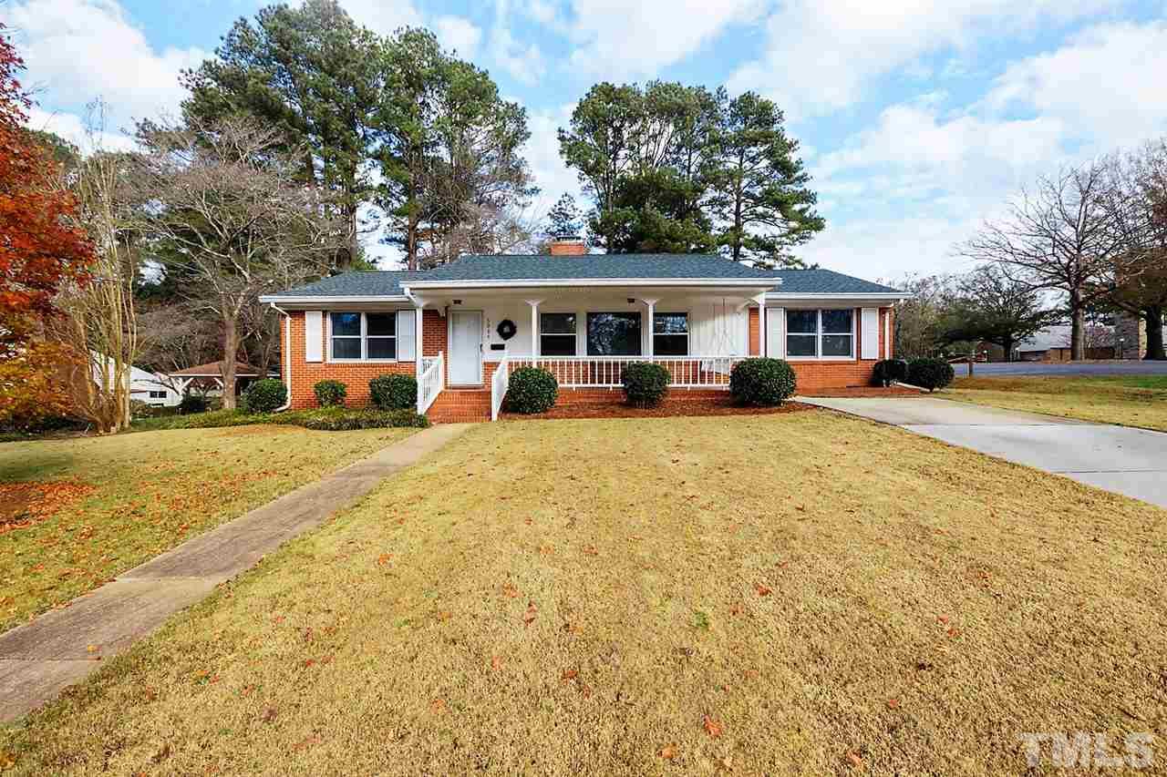 5004 Kaplan Drive Raleigh, NC 27606 - Photo 1 of 30 a view of a house with a yard covered in snow