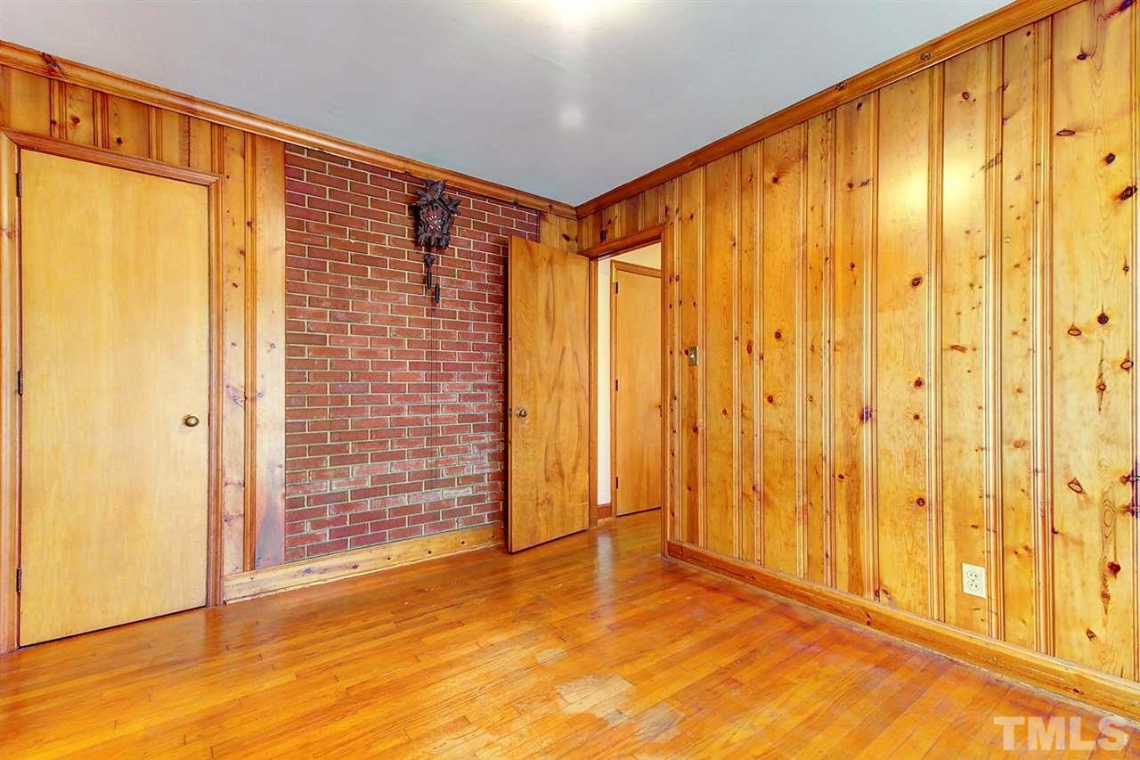 5004 Kaplan Drive Raleigh, NC 27606 - Photo 17 of 30 a view of an empty room and window