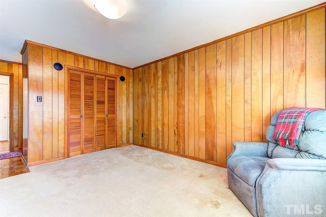 5004 Kaplan Drive Raleigh, NC 27606 - Photo 25 of 30 a bedroom with a bed and furniture