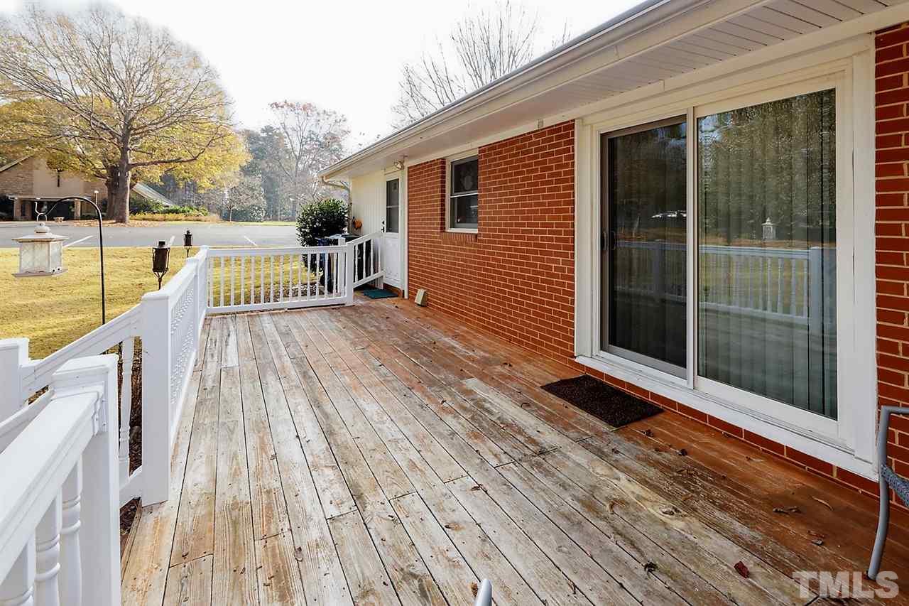 5004 Kaplan Drive Raleigh, NC 27606 - Photo 27 of 30 a view of outdoor space with deck and living room