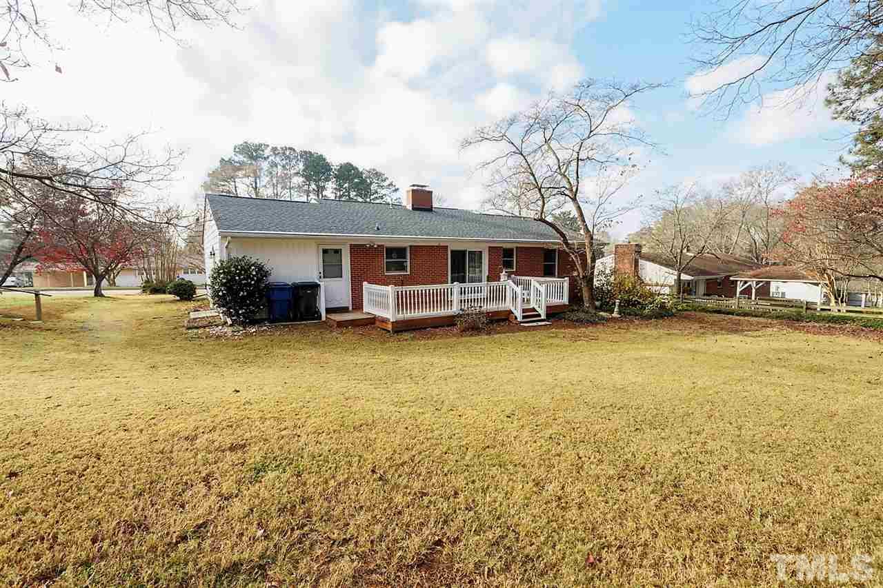 5004 Kaplan Drive Raleigh, NC 27606 - Photo 30 of 30 a view of a house with a yard covered with snow