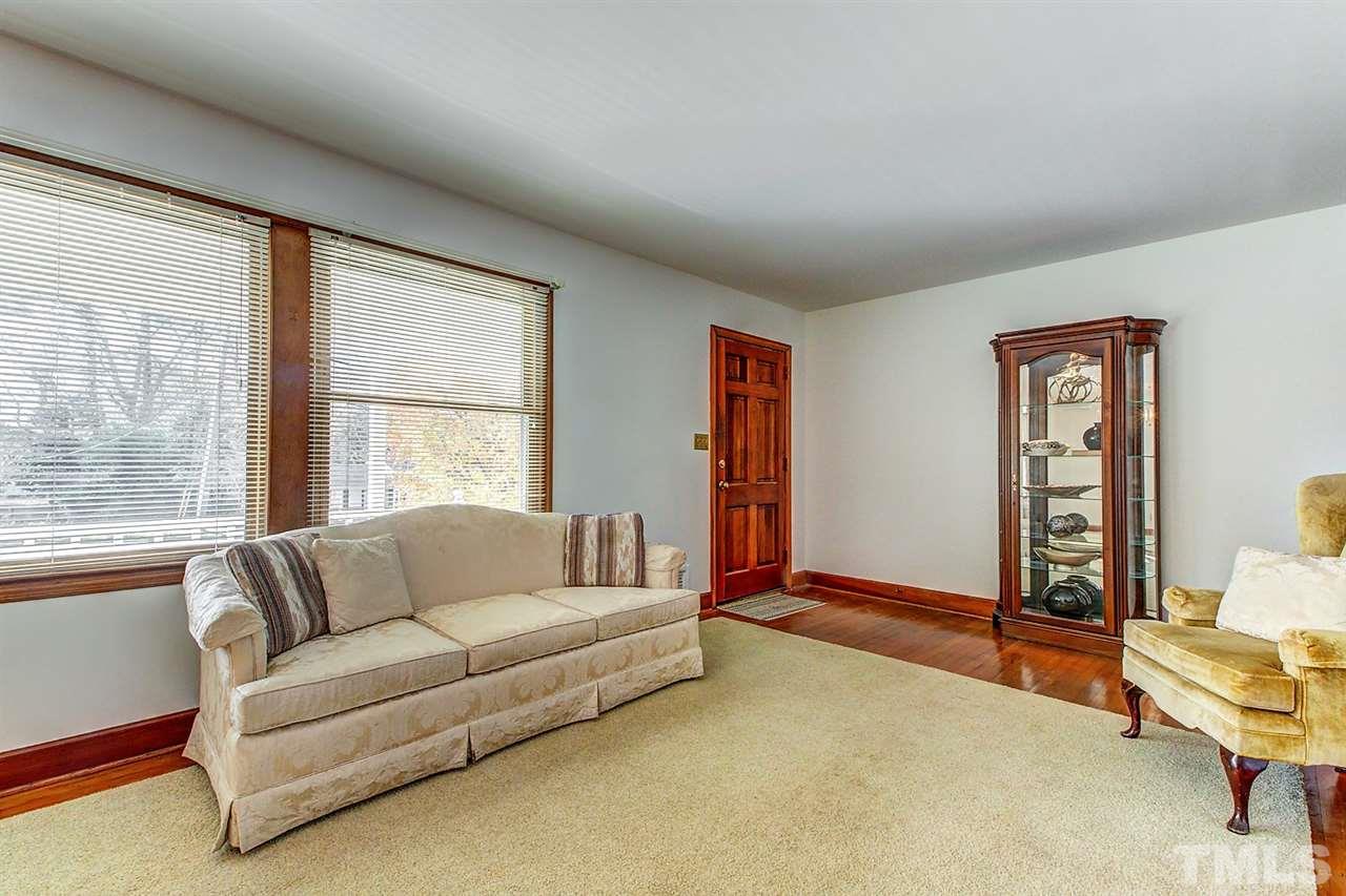 5004 Kaplan Drive Raleigh, NC 27606 - Photo 6 of 30 a living room with furniture and a window