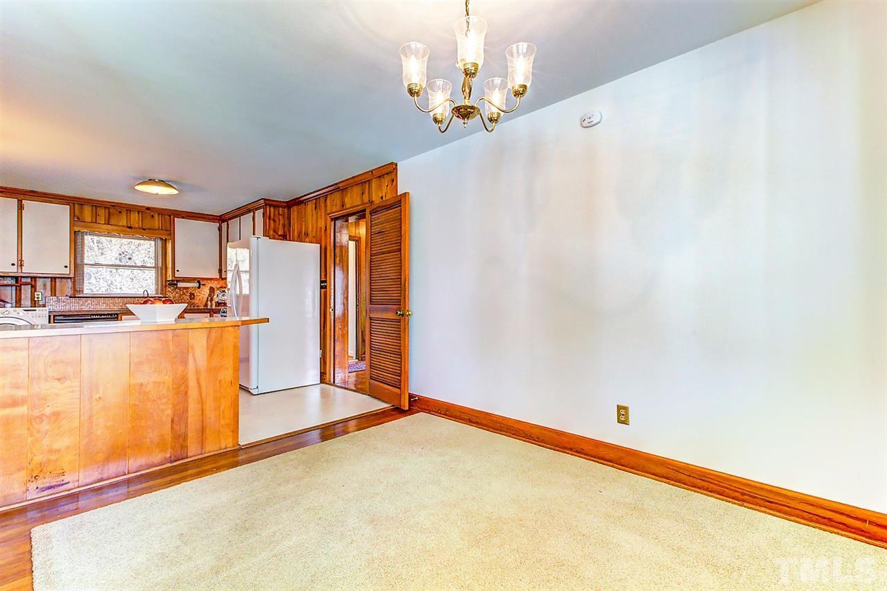 5004 Kaplan Drive Raleigh, NC 27606 - Photo 9 of 30 a view of a kitchen with wooden floor
