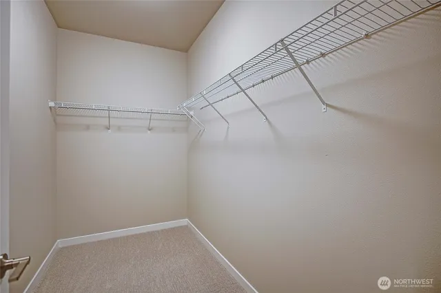 a view of a room with racks on the wall