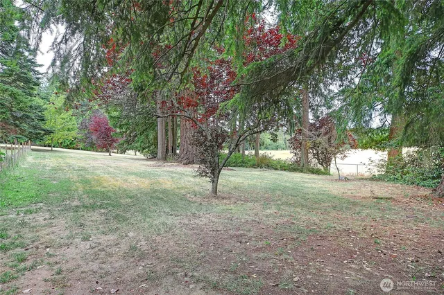 a fire hydrant in the middle of a field