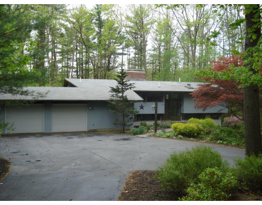 252 Main Street Boxford, MA 01921 - Photo 1 of 1 a backyard of a house with a yard and outdoor seating