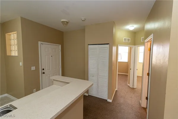 a bathroom with a sink a mirror and a shower