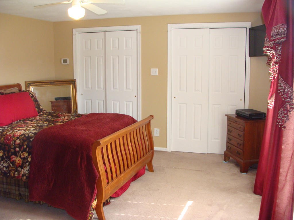 47 Henry Marsh Road Dudley, MA 01571 - Photo 13 of 30 a bedroom with a bed and a window