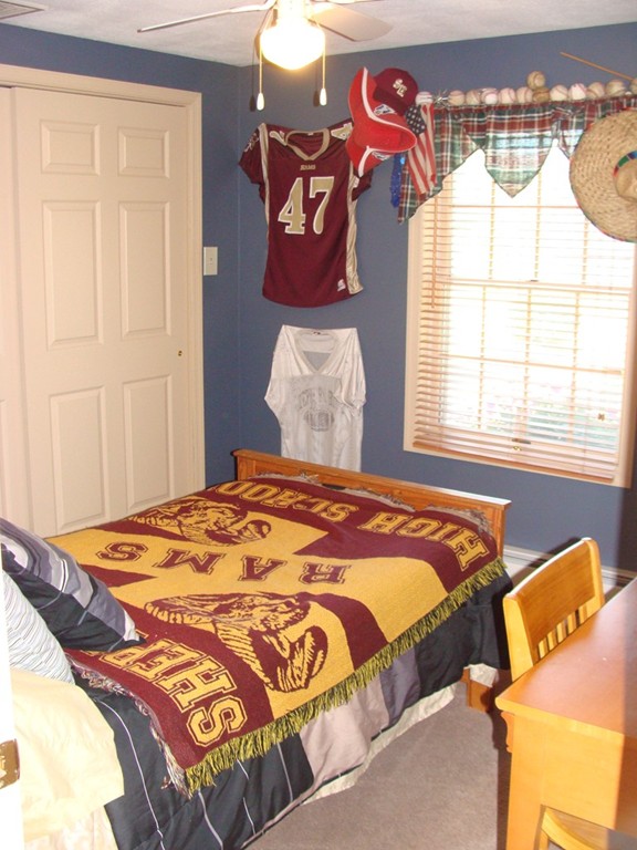 47 Henry Marsh Road Dudley, MA 01571 - Photo 16 of 30 a bedroom with a bed and window