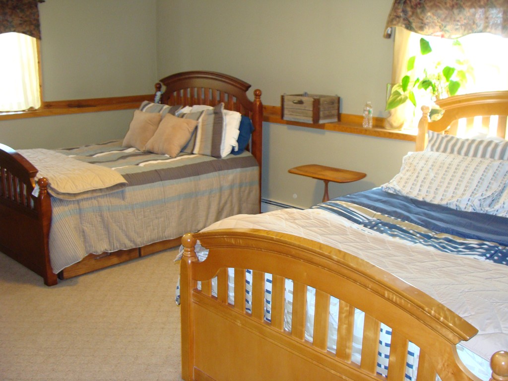 47 Henry Marsh Road Dudley, MA 01571 - Photo 18 of 30 a bedroom with a bed and a window