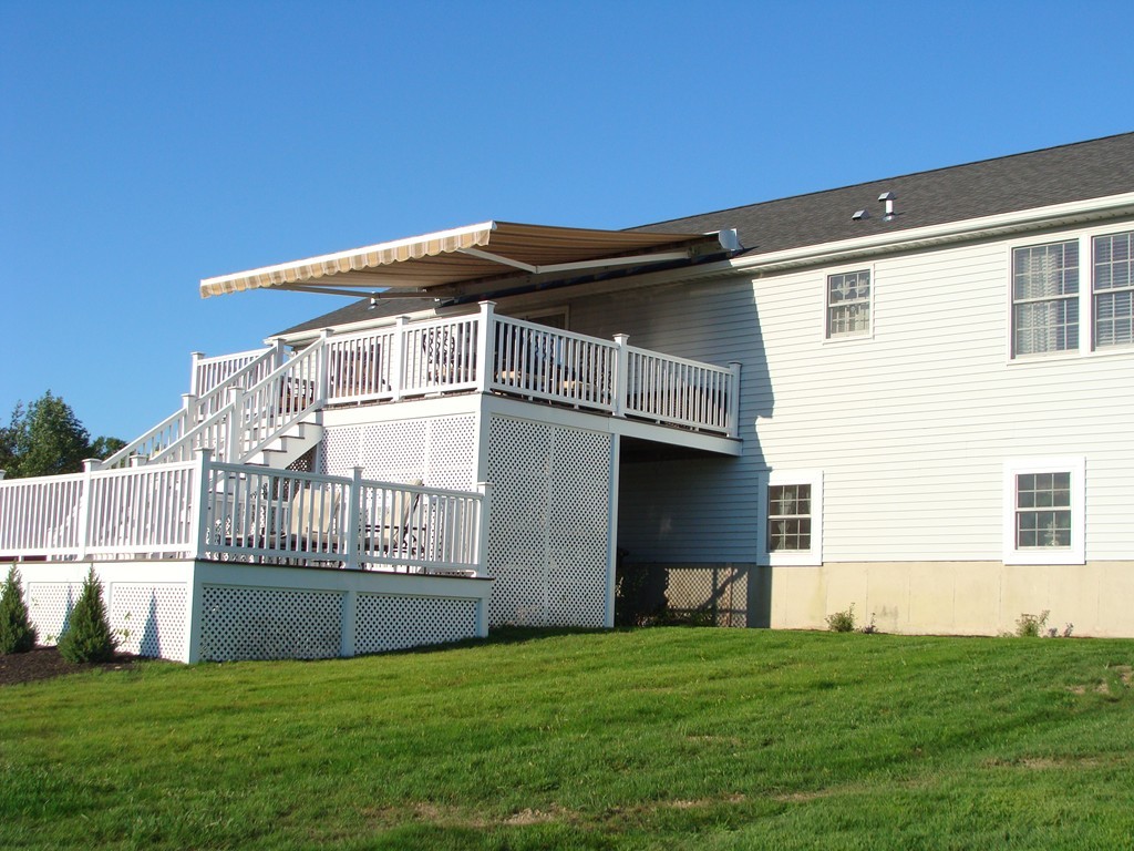 47 Henry Marsh Road Dudley, MA 01571 - Photo 26 of 30 a front view of a house with a garden