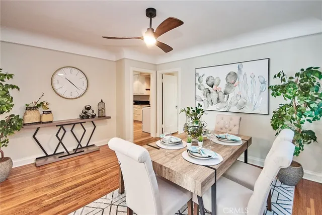 a kitchen with a sink a stove and cabinets