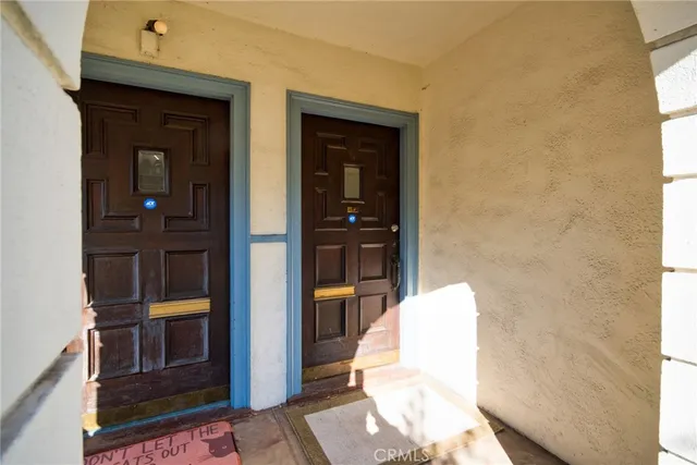 a view of front door and bedroom