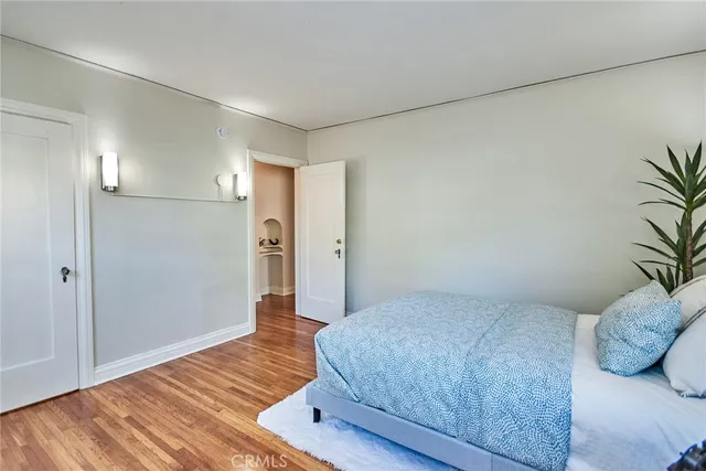 a living room with furniture a fireplace and a large window