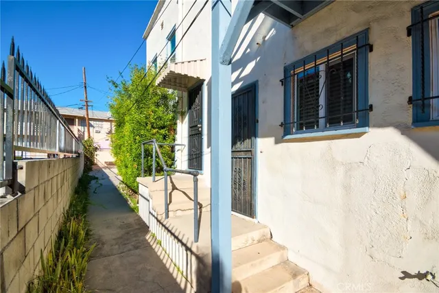 a view of a house with a street