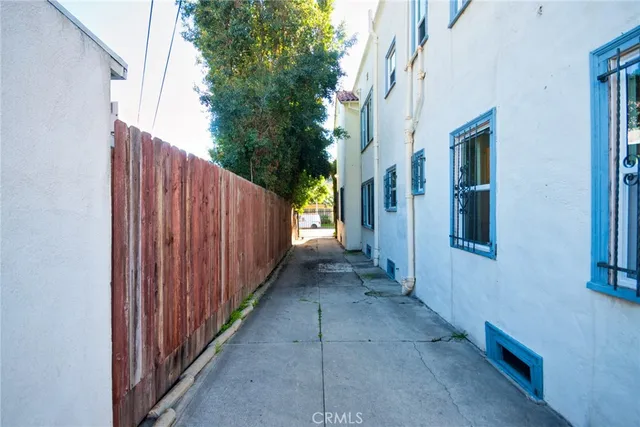 a view of a house with a street