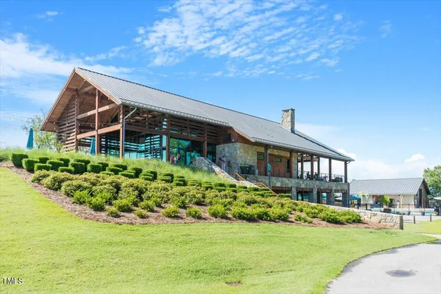 a view of house with outdoor space and porch
